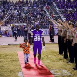 Homecoming King candidate Damion Charleston with his escort.